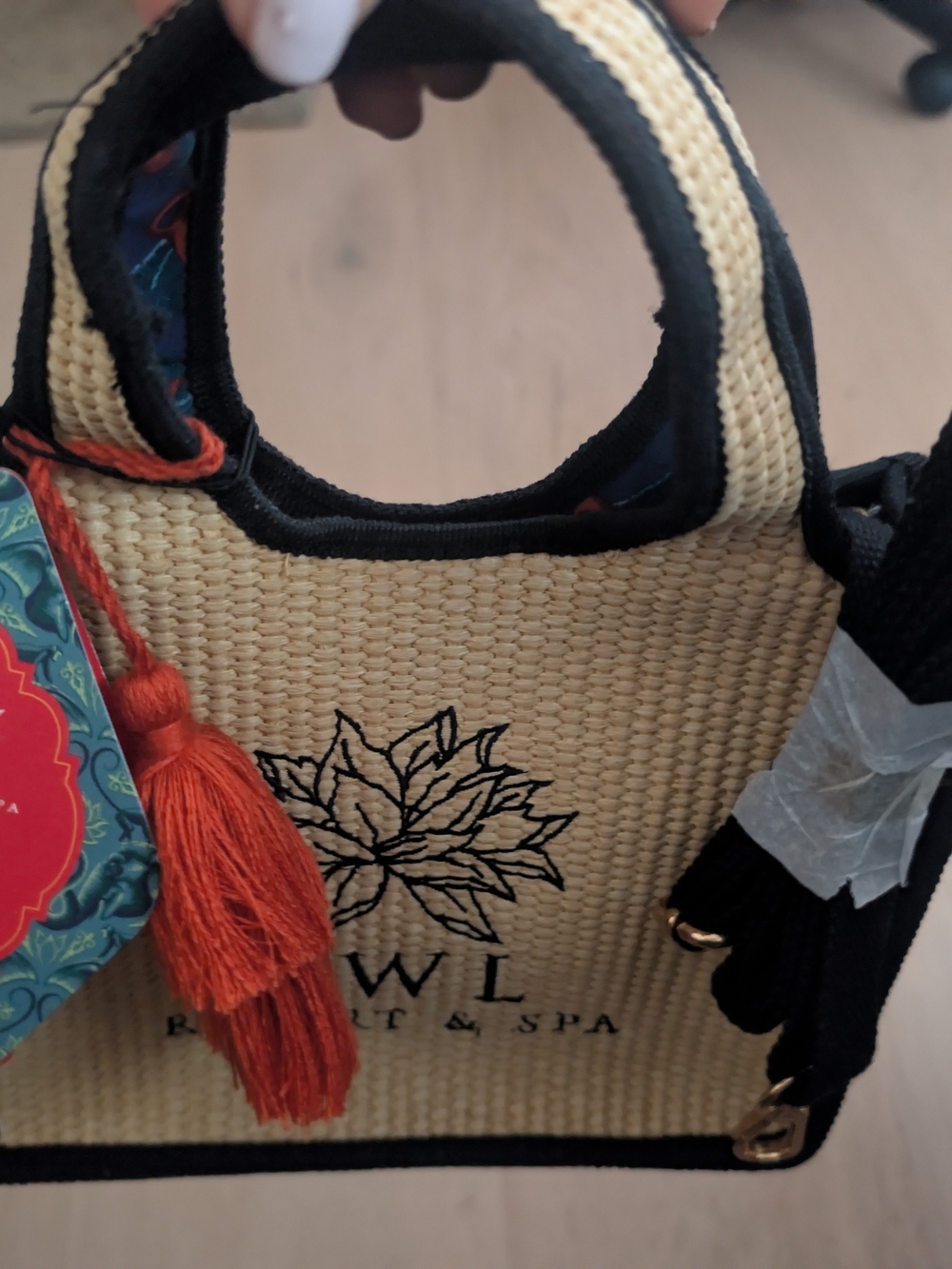 Kiehl' Crossbody Raffia Bag with Black Trim and Orange Tassel NEW